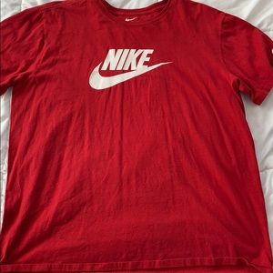 A red Nike shirt